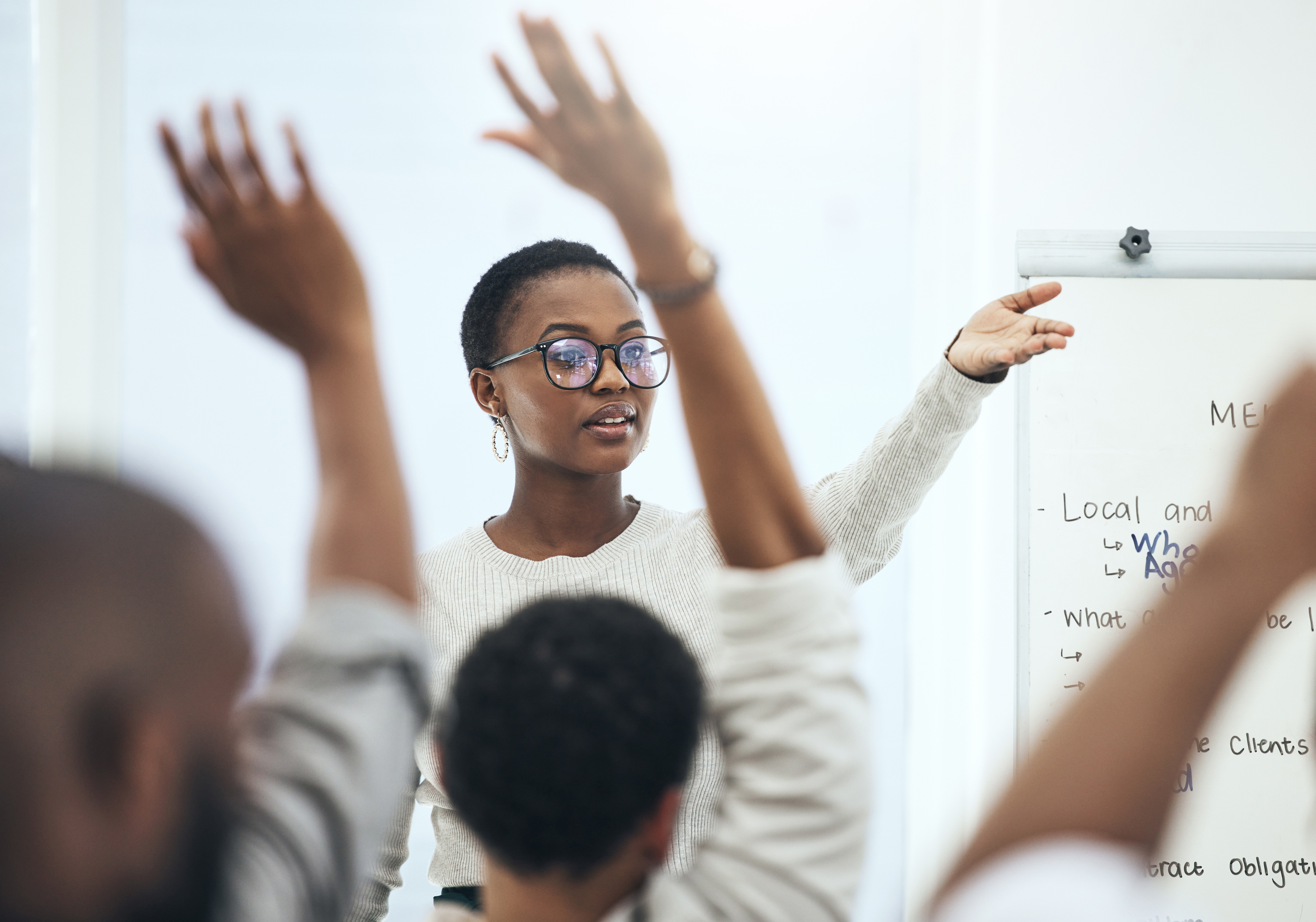 Teacher helping student